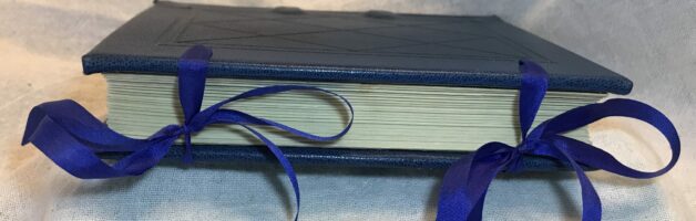 Sewn On Cord Hardbound Book With Integrated Silk Ties by Isabel del Okes